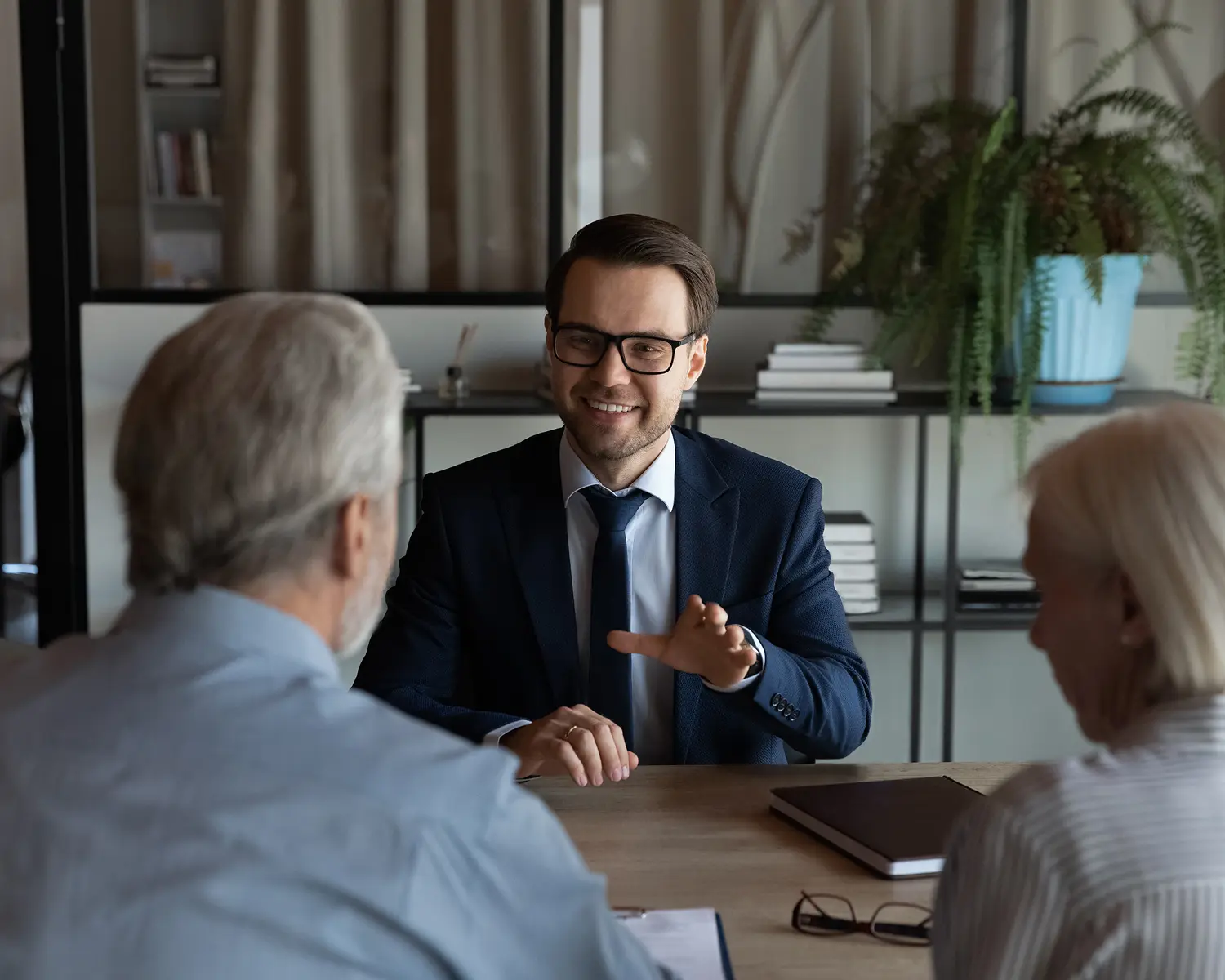 Friendly conversation in modern office setting