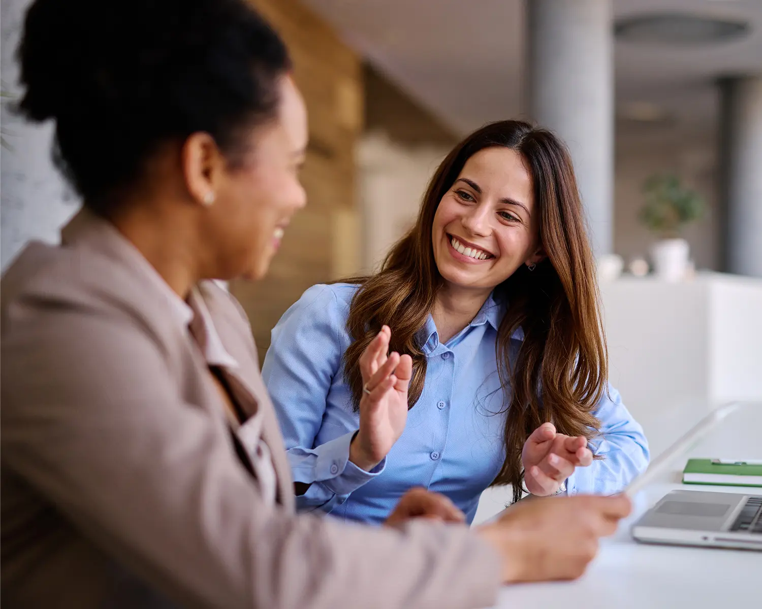 Two women having a friendly conversation