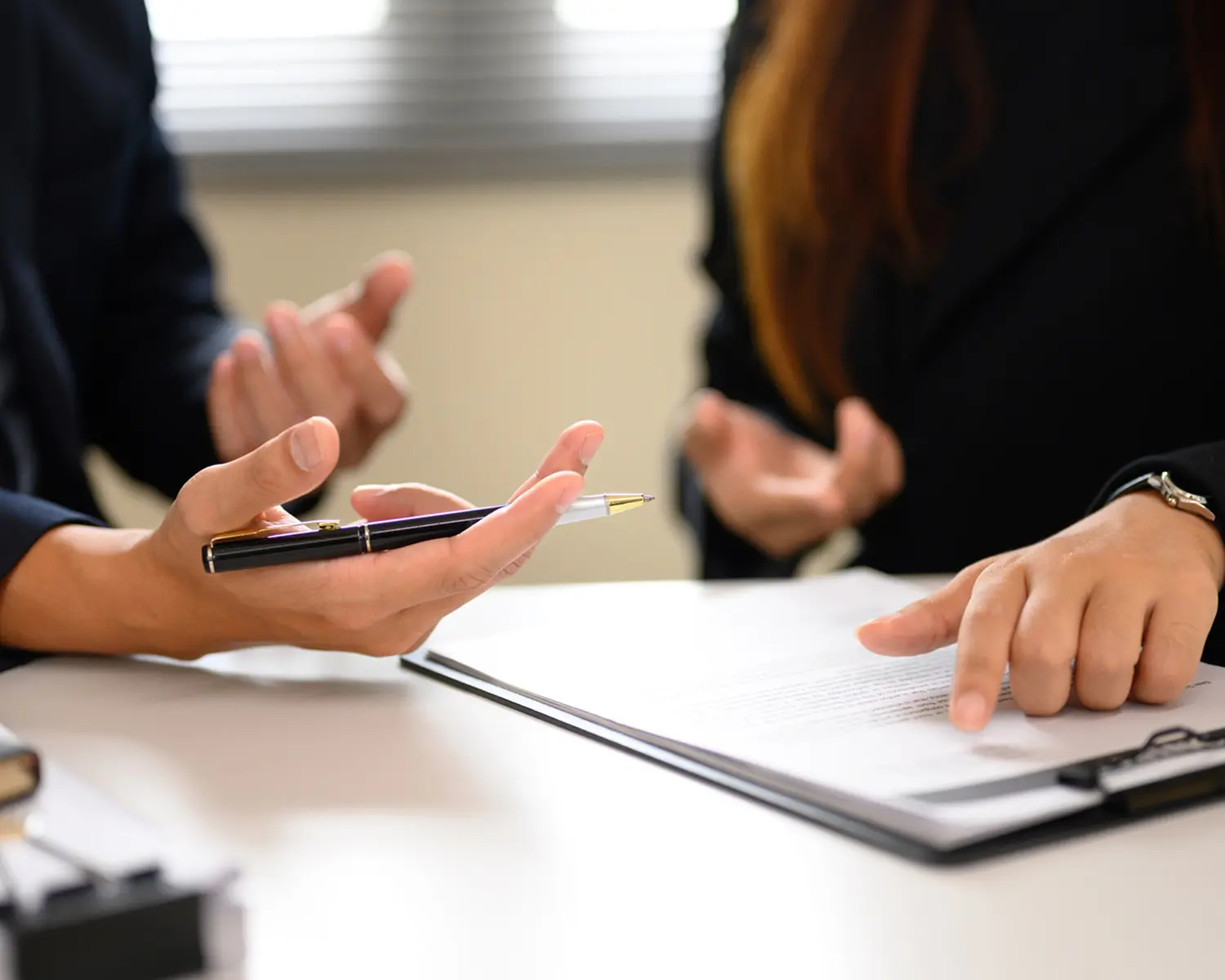 Business meeting with document discussion