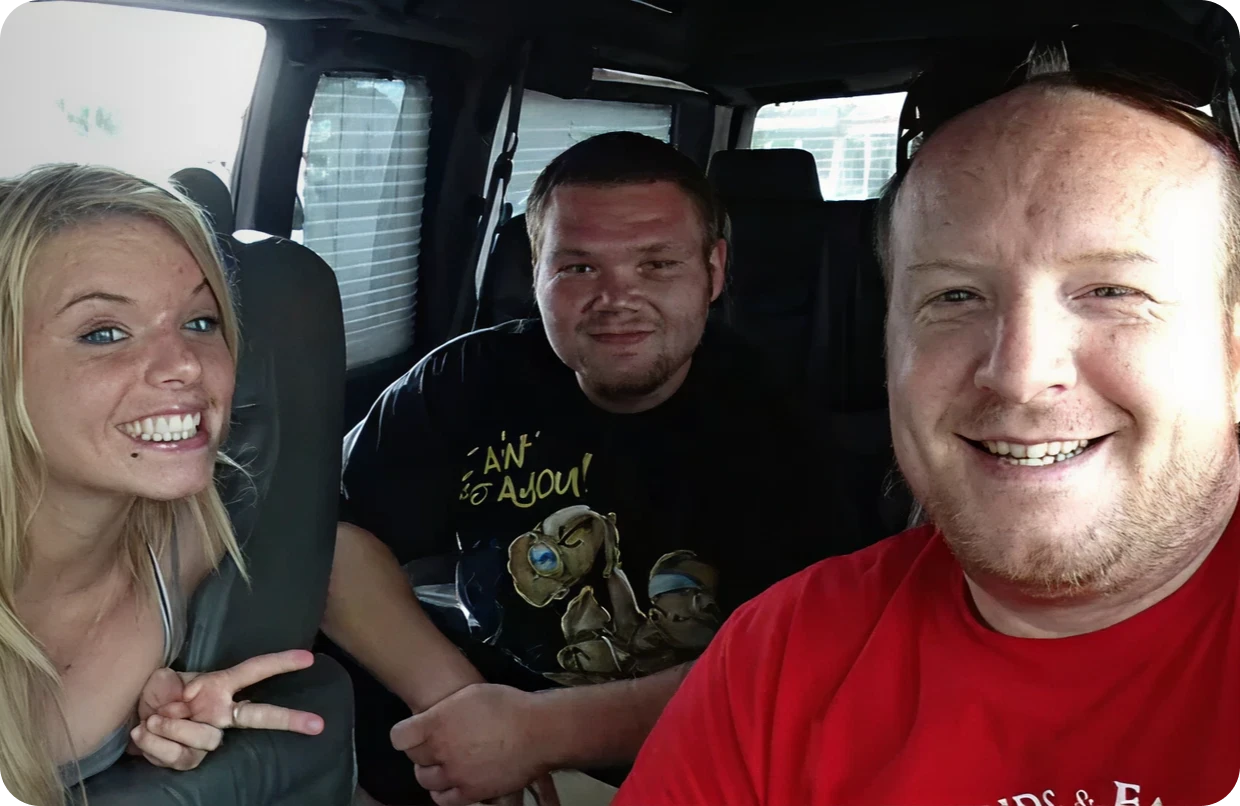 Group selfie inside a vehicle